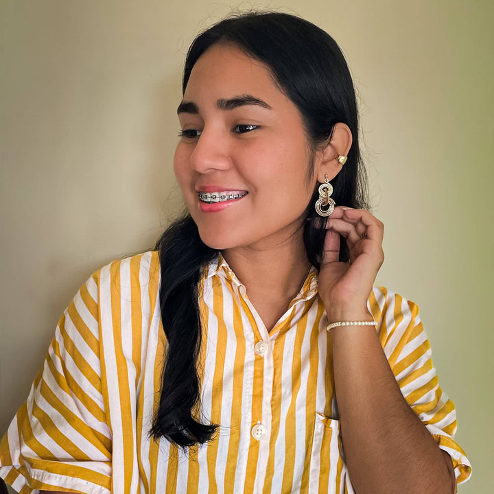 Ripple gold earrings
