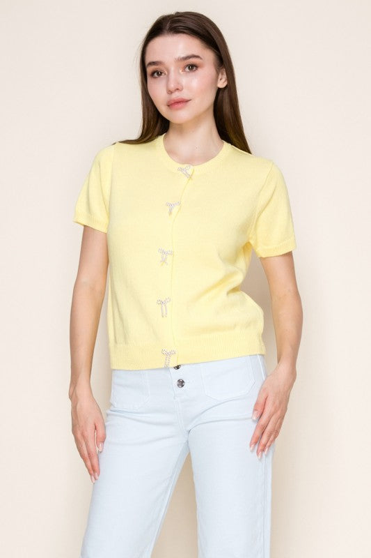 White Birch - Short sleeve solid knit top with ribbon buttons