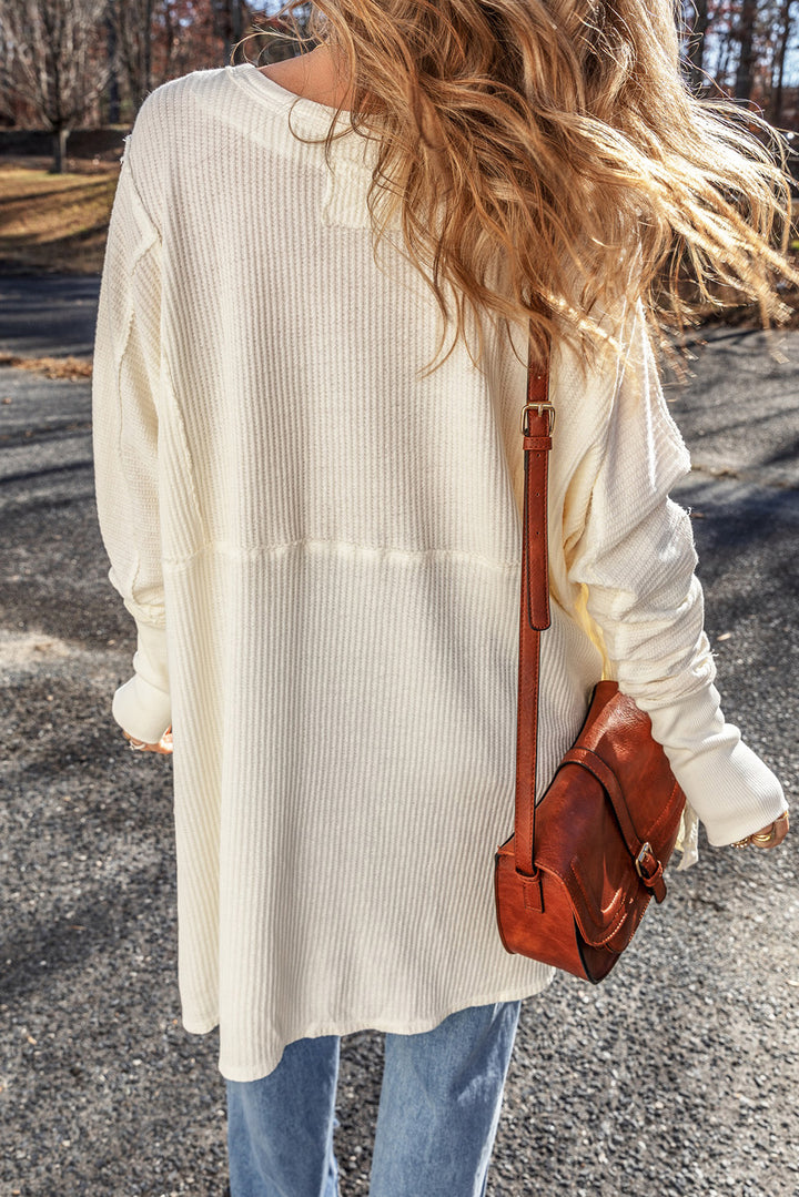 The Bouncing Doodle Exposed Seam Round Neck Long Sleeve Blouse